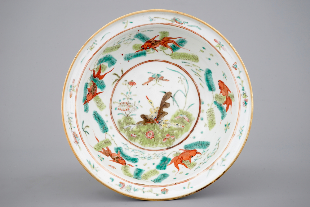 A Chinese polychrome bowl decorated with butterflies and fish, 19th C.