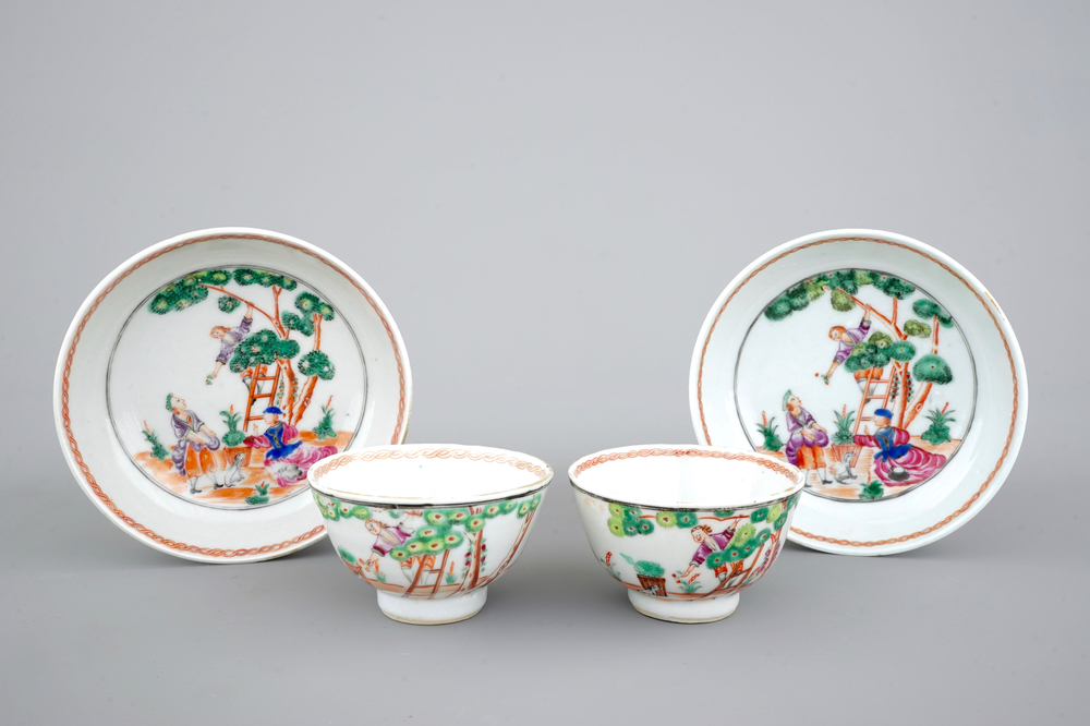 A pair of Chinese famile rose export porcelaine cup and saucers with cherry pickers, 18th C.