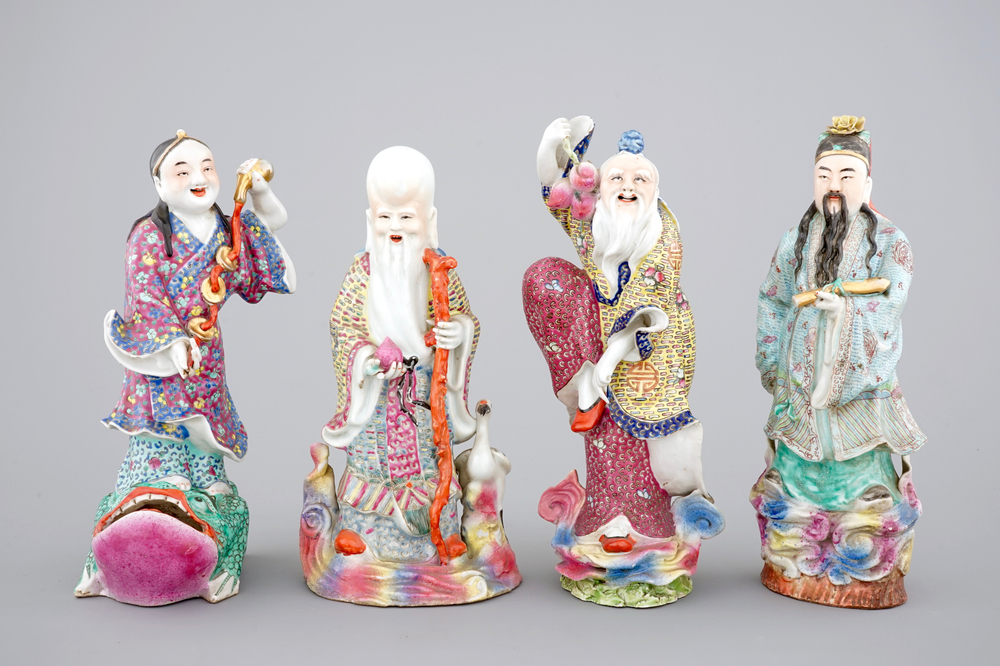 A set of four Chinese famille rose porcelain figures, 19th C.