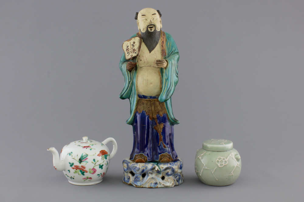 A Chinese sancai-glazed pottery figure, a famille rose teapot and a small ginger jar, 19th C.