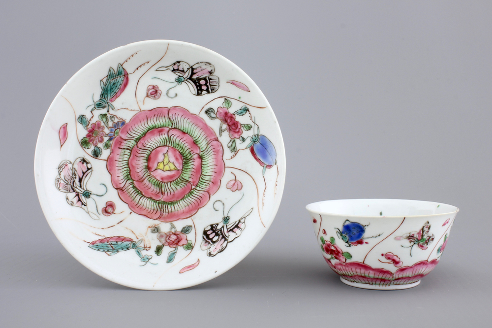 A Chinese porcelain famille rose cup and saucer with insects encircling a rose, Yongzheng-Qianlong, 18th C.