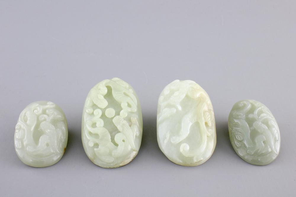A set of 4 pale celadon jade carvings, 19/20th C.