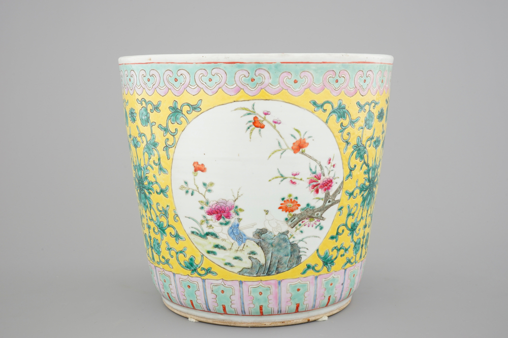 A tall Chinese famille rose yellow ground jardiniere, 19th C.