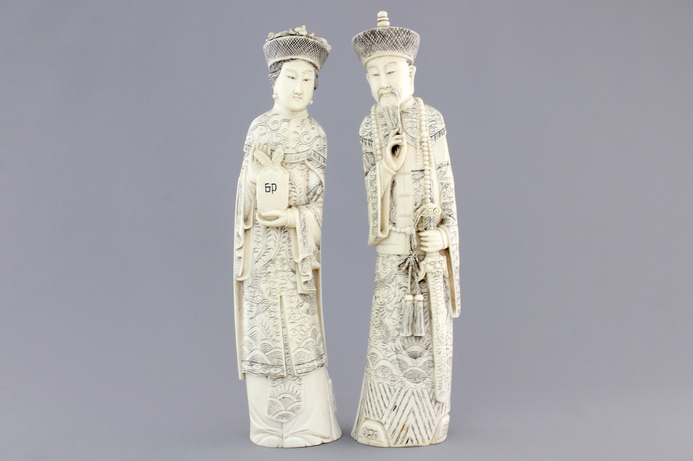 Two Chinese ivory carved figures of the emperor couple, ca. 1920