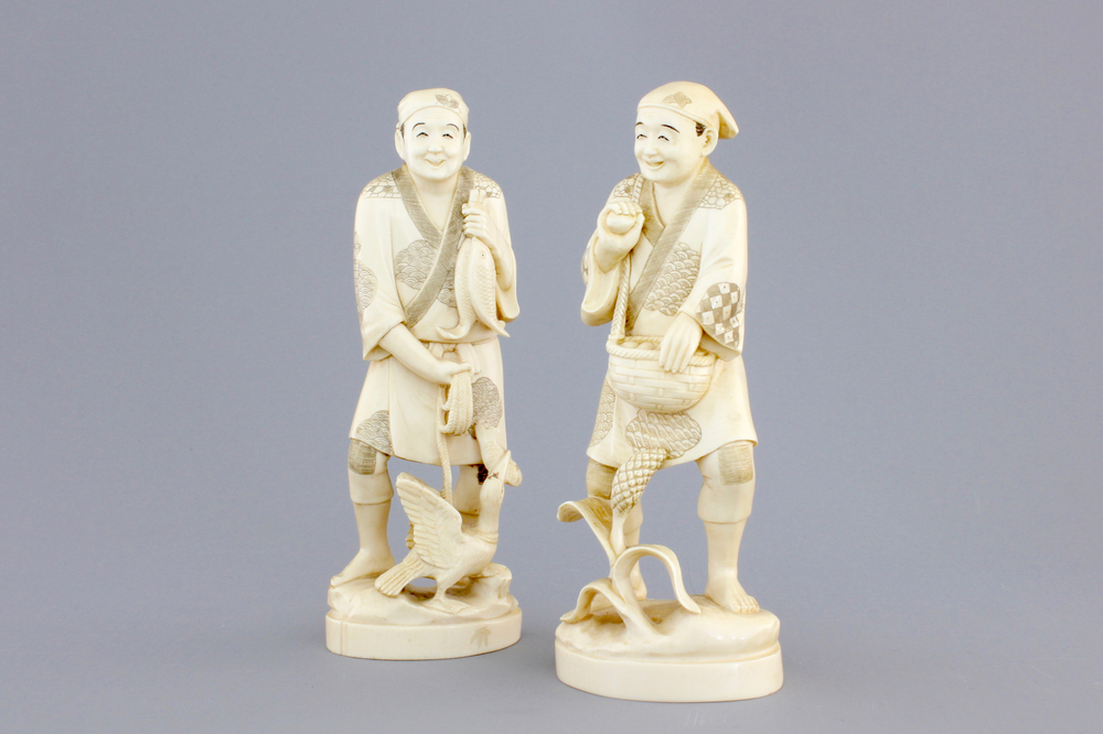 A pair of Japanese carved ivory fishermen, Meiji, 19th C.
