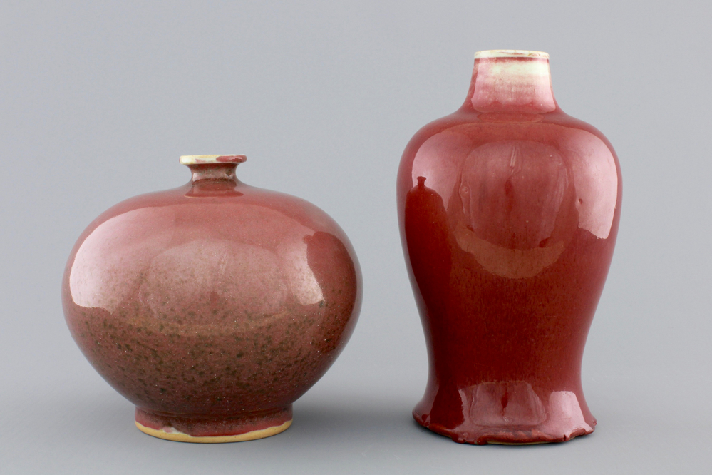 A Chinese langyao baluster-shaped vase and a peachbloom red vase, 19th C.