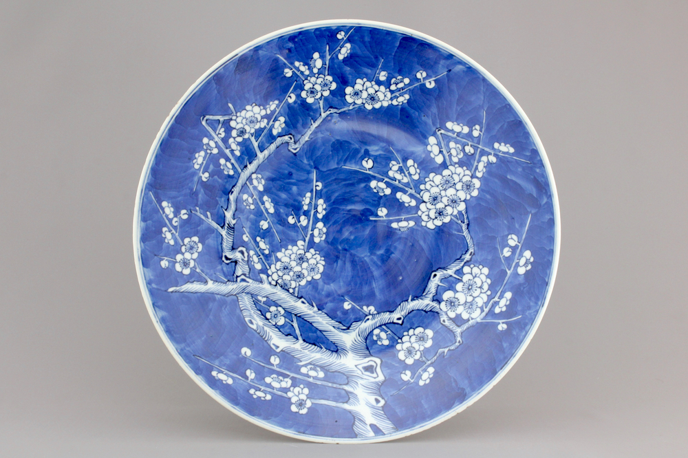 A Chinese porcelain dish with prunus blossoms, 19th C