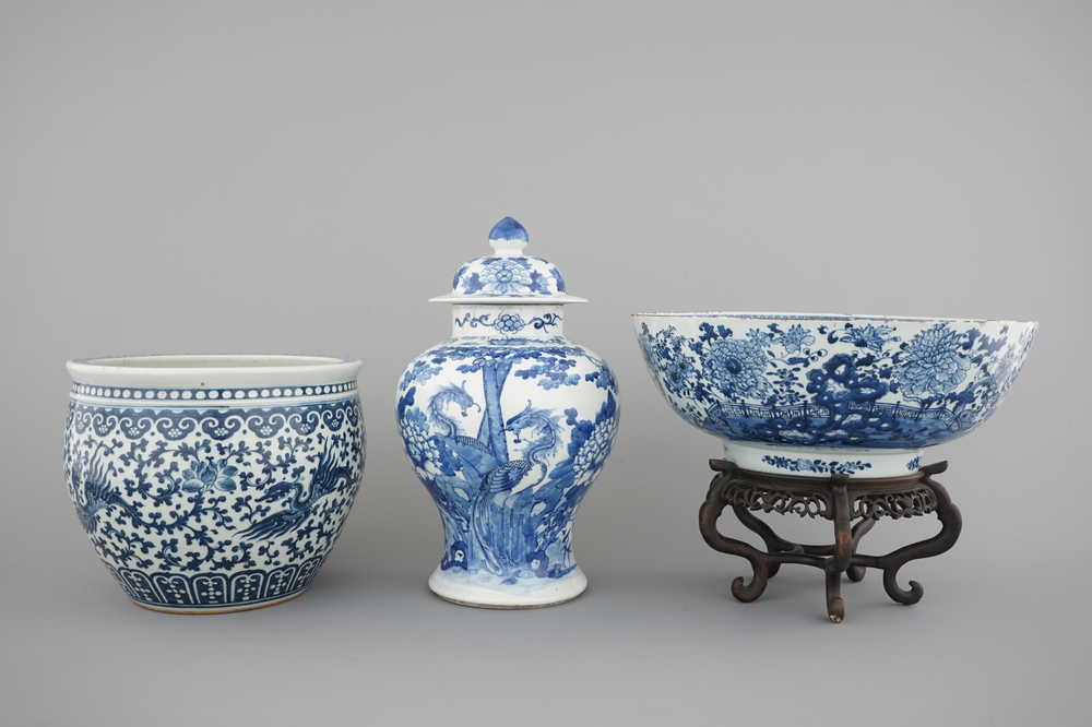 Blue and white Chinese porcelain: A large Qianlong punchbowl, a fish bowl and a vase with cover, 19th C.