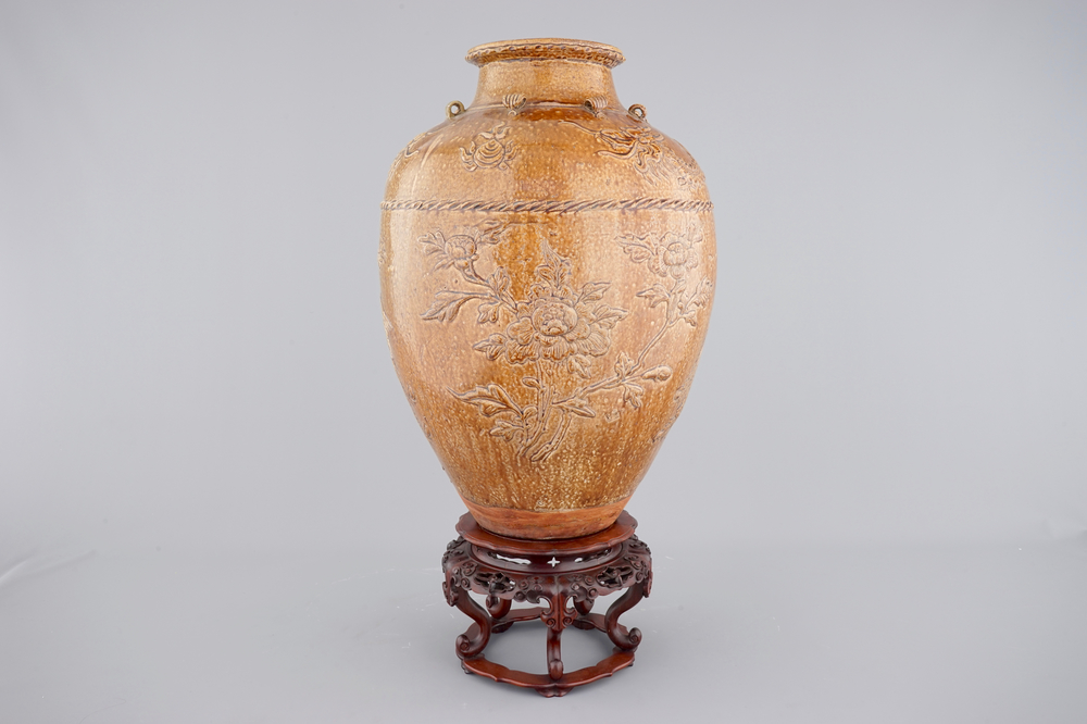 A large Martaban on a carved hardwood stand, 18/19th C.