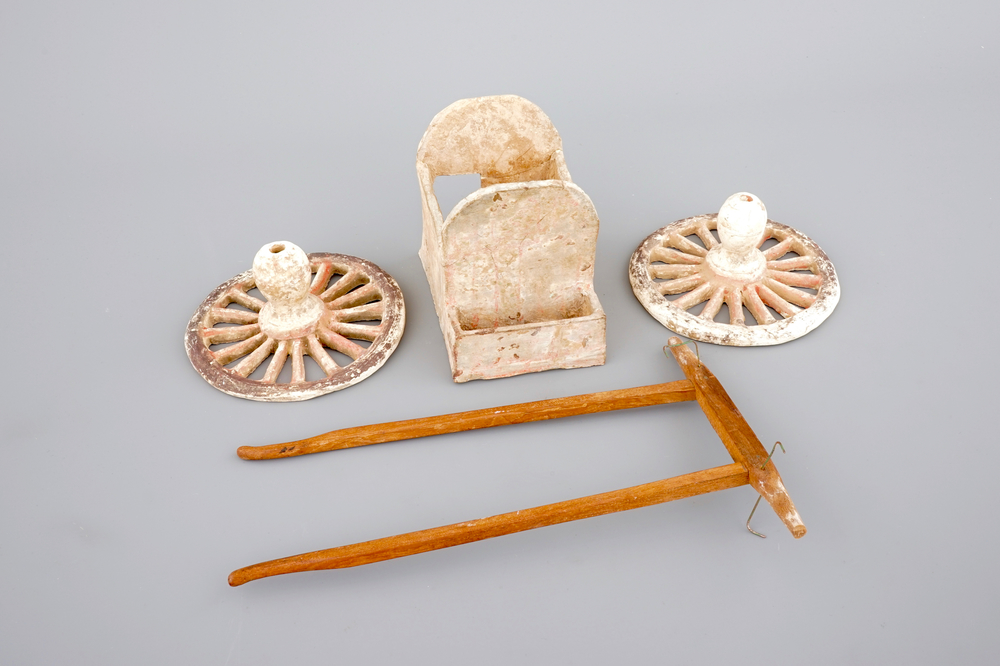 A Chinese terracotta cart with wooden attachment, possibly Han Dynasty (2nd C. b.C - 2nd C. a.C.)