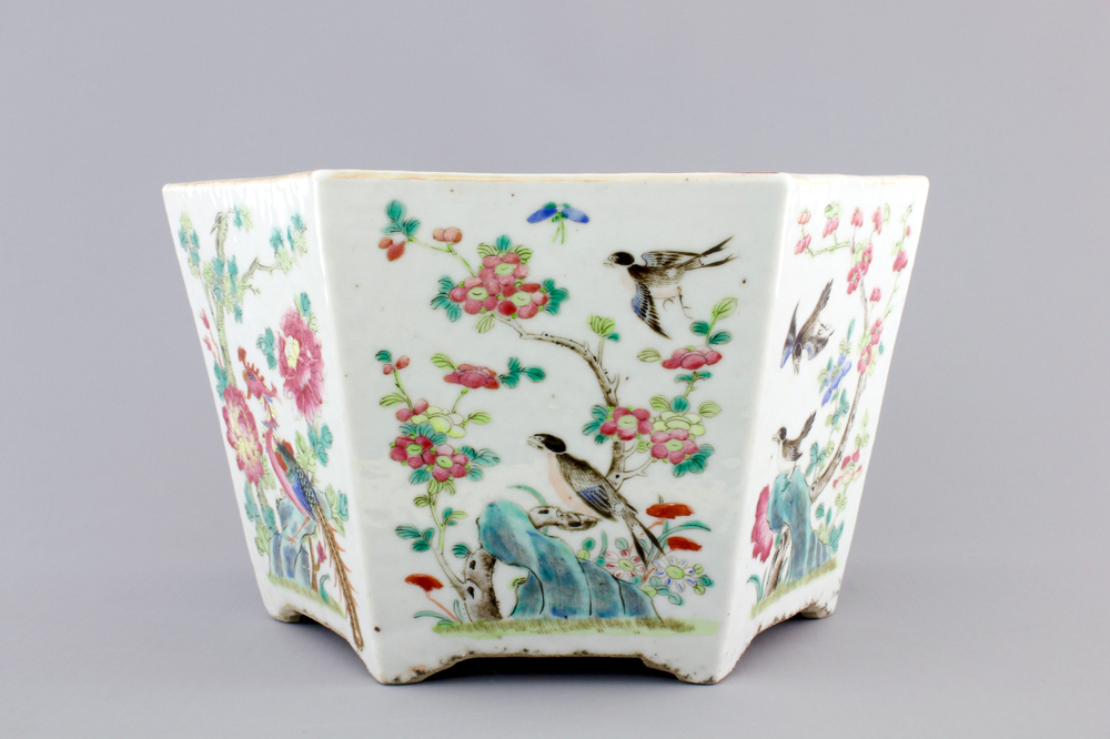 A Chinese hexagonal porcelain famille rose jardiniere with animals and flowers, 19th C.