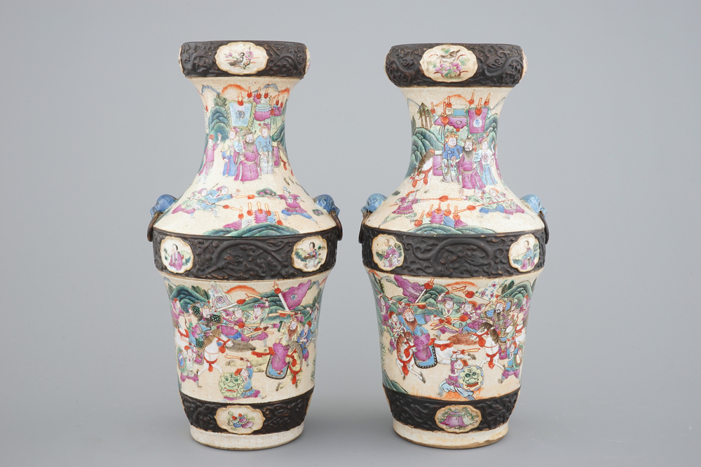A pair of Chinese Nanking famille rose vases with warrior scenes, 19th C.
