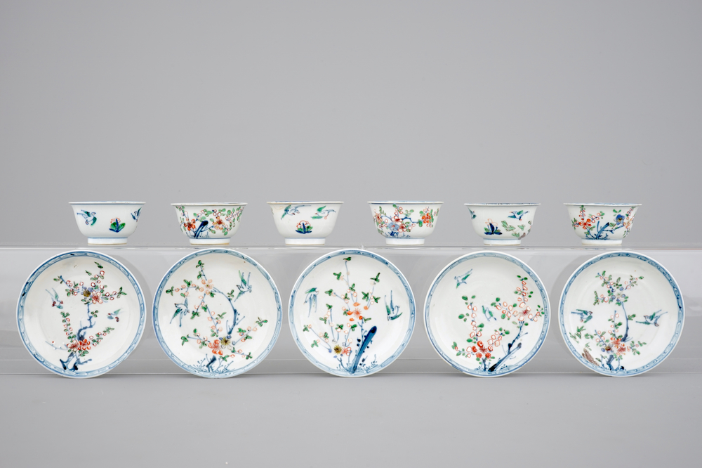 A set of six Chinese famille verte cups and five saucers, Kangxi, 18th C.