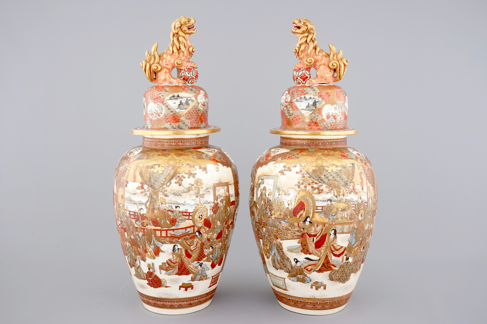 A very tall pair of Japanese Satsuma vases and covers, 19th C.