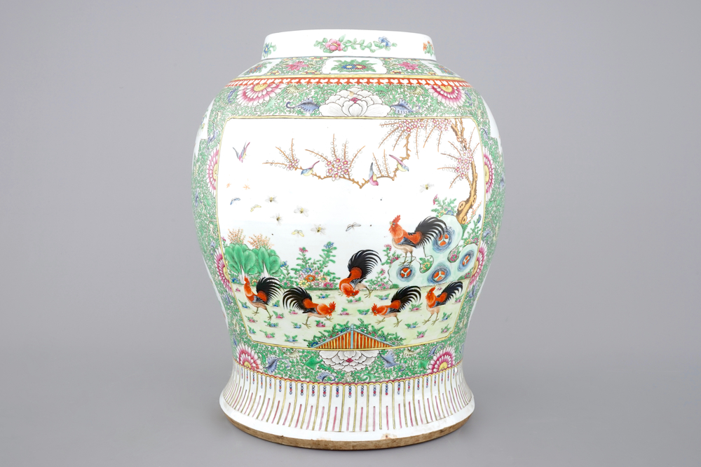 A Chinese famille rose porcelain vase with a peacock, 19th C.
