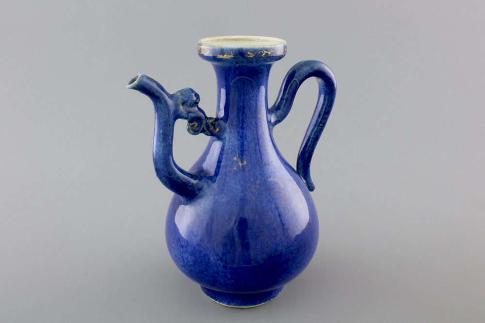 A Chinese blue poudre gold-painted jug, Kangxi, ca. 1700
