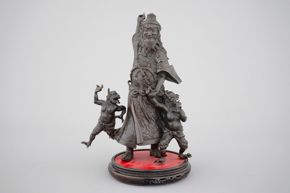 A Chinese mythological bronze group, 19/20th C.