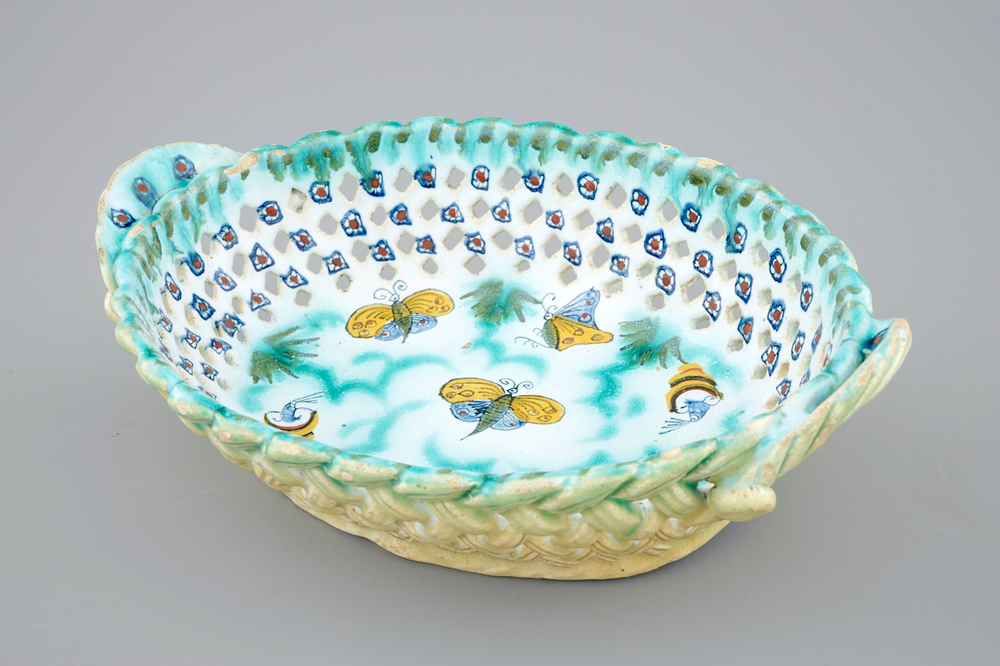 A Brussels faience basket with butterflies and caterpillars, 18th C.