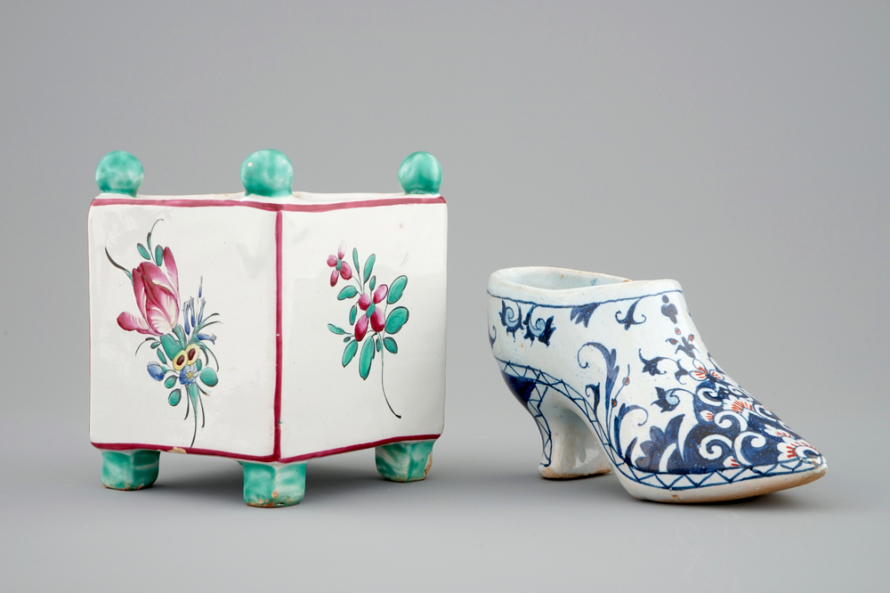 A French faience miniature square flower pot and a Rouen faience shoe, 18/19th C.