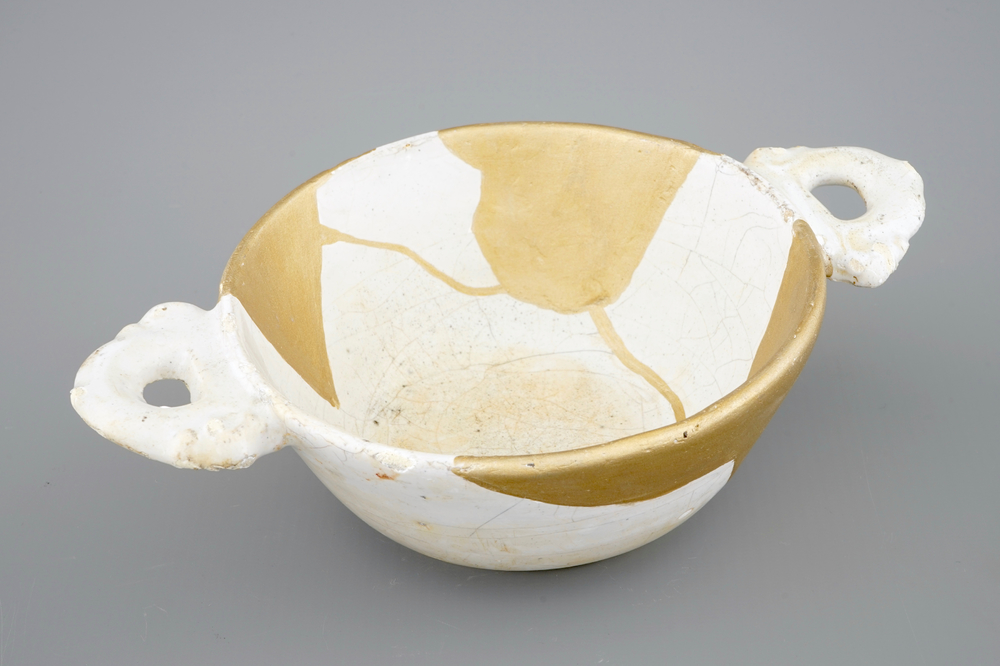 A white Dutch Delft porringer with kintsugi style repair, 17th C.
