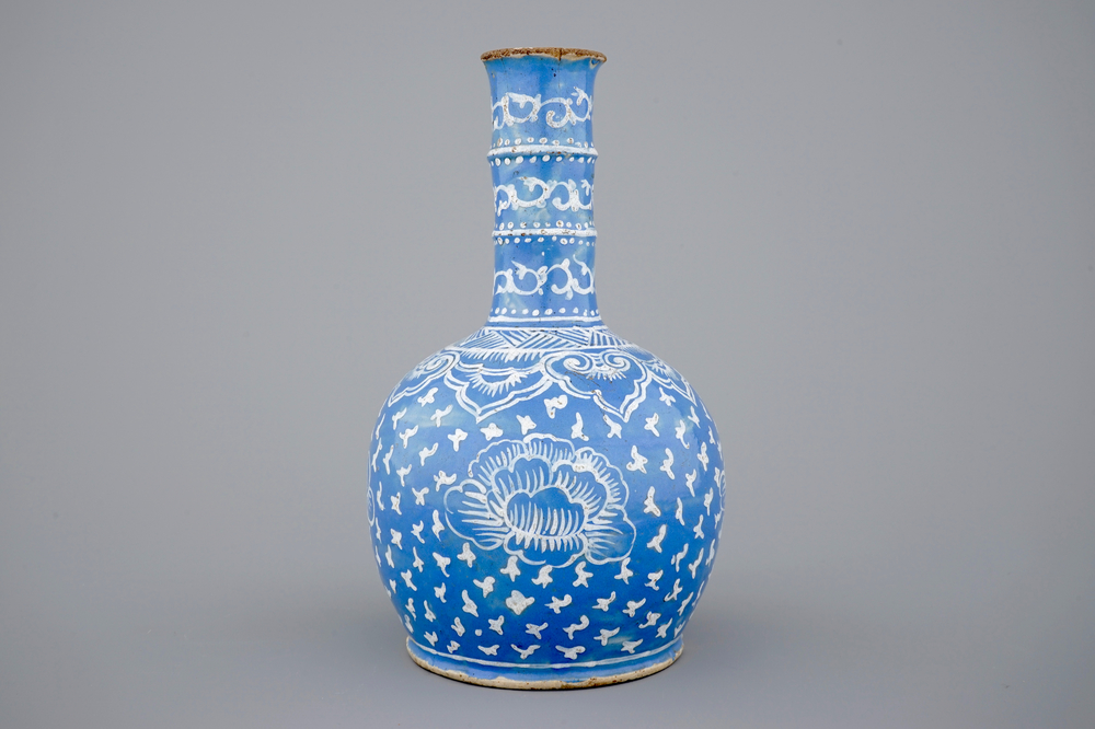 A bottle-shaped Persian style blue ground vase, poss. France, 18/19th C.