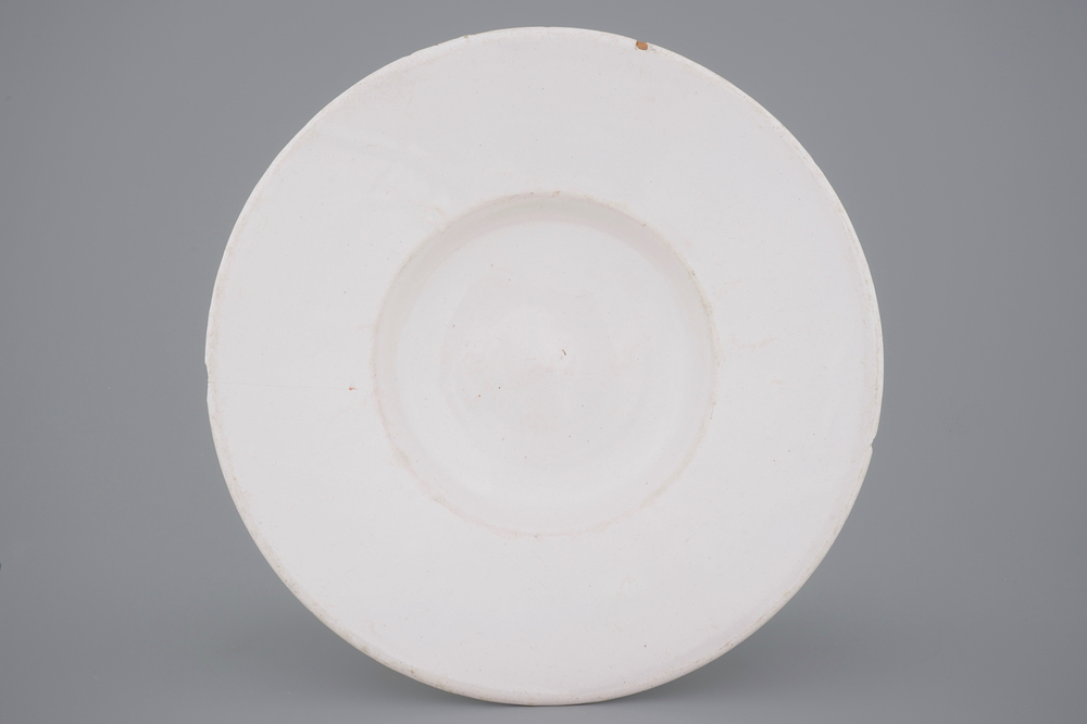 A large white monochrome Delftware dish, 17/18th C.