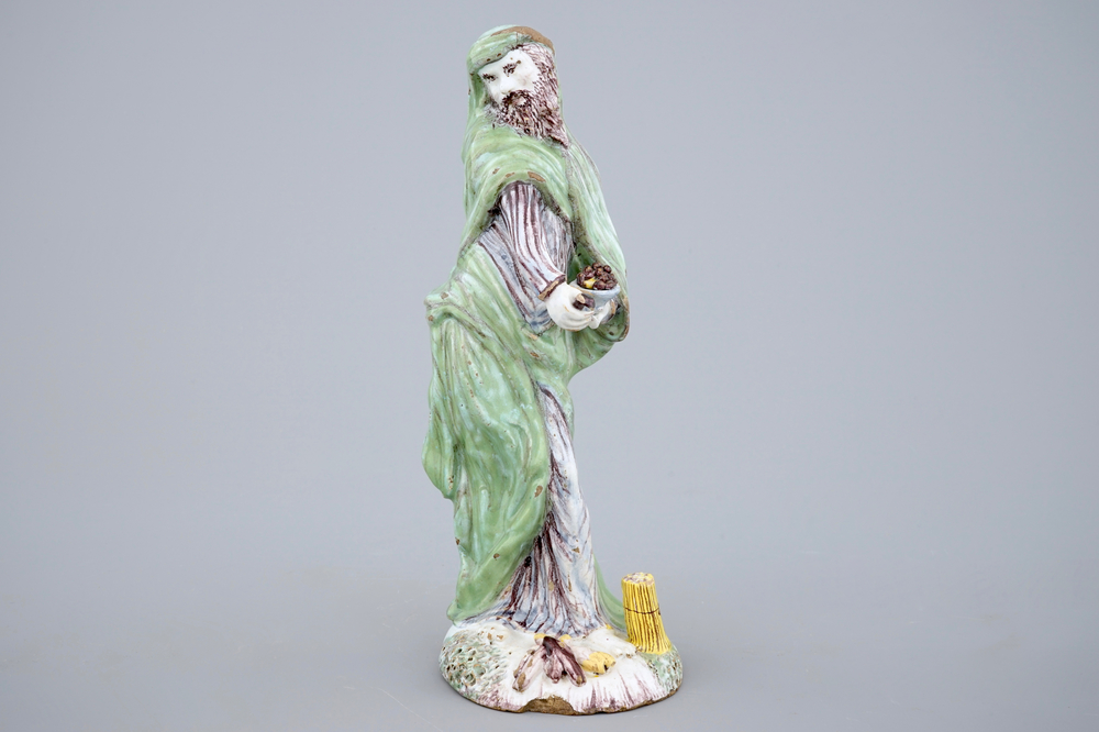 A tall standing figure of a saint, polychrome Dutch Delftware, 18th C.