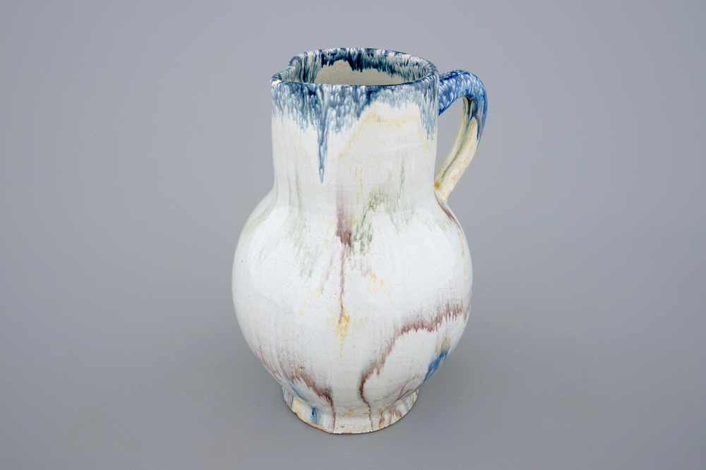 A French faience faux-marbre jug, Rouen, Poterat workshop, 18th C.
