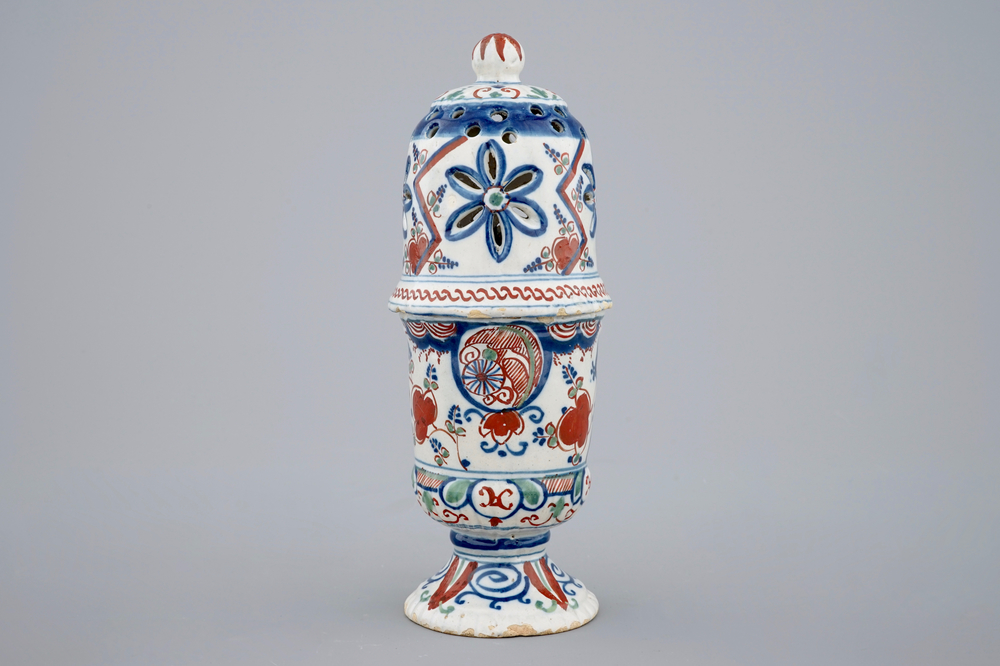 A polychrome Dutch Delft caster with lightning decoration, late 17th C.