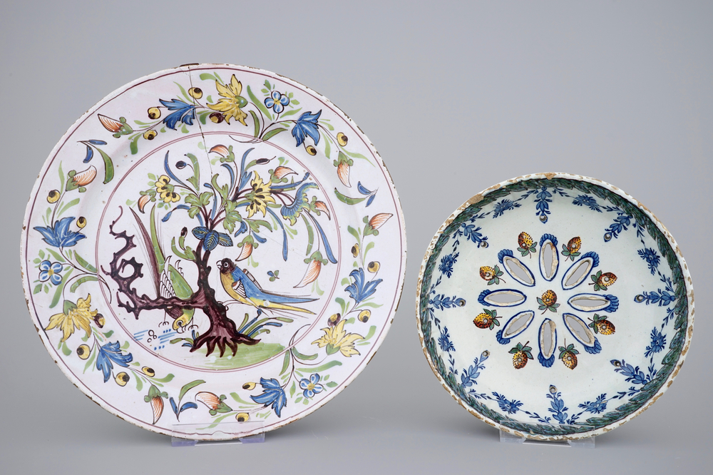 Un fraisier en Delft polychrome et une plat en fa&iuml;ence de Saint-Amand-les-Eaux, 18&egrave;me