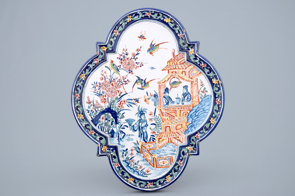 A polychrome Dutch Delft chinoiserie plaque, 19th C.