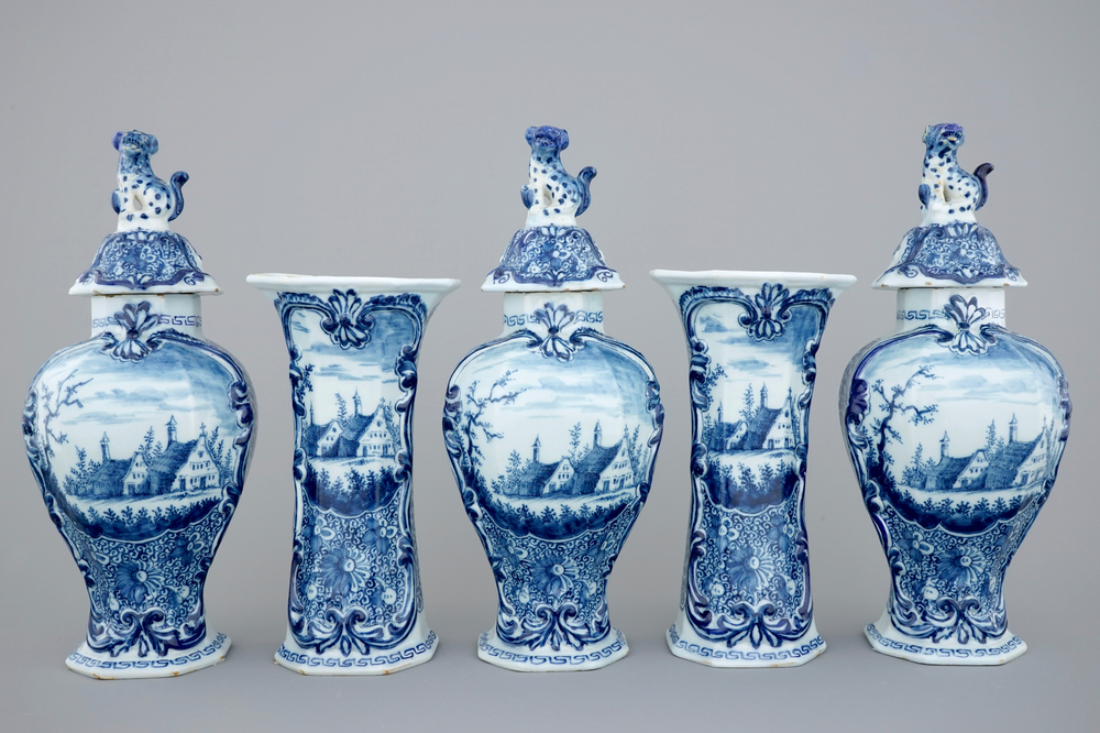 A 5-piece blue and white Dutch Delft garniture with landscape design, 18th C.