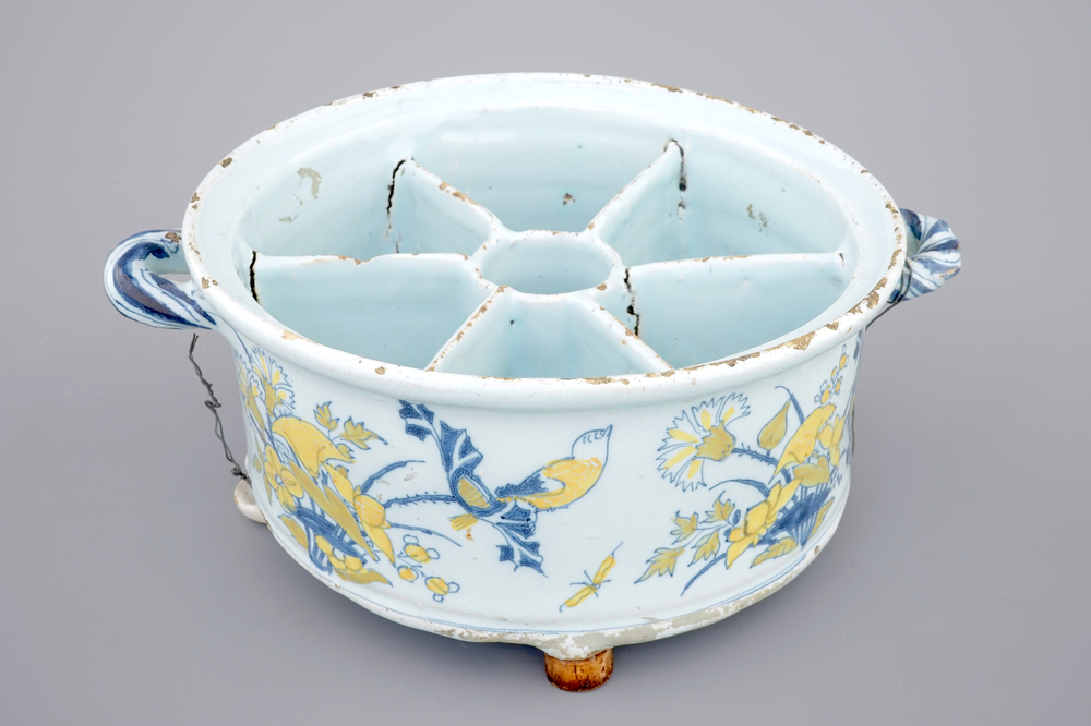 A Dutch Delft spice box with birds among foliage, 17th C.