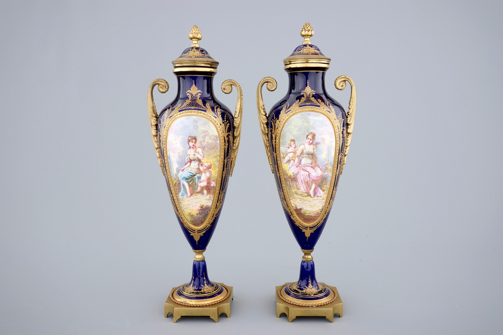 A pair of bronze-mounted signed and marked S&egrave;vres porcelain vases, 19th C.