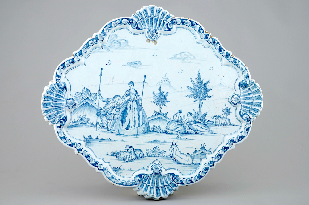 A blue and white Dutch Delft plaque with a romantic scene, 18th C.