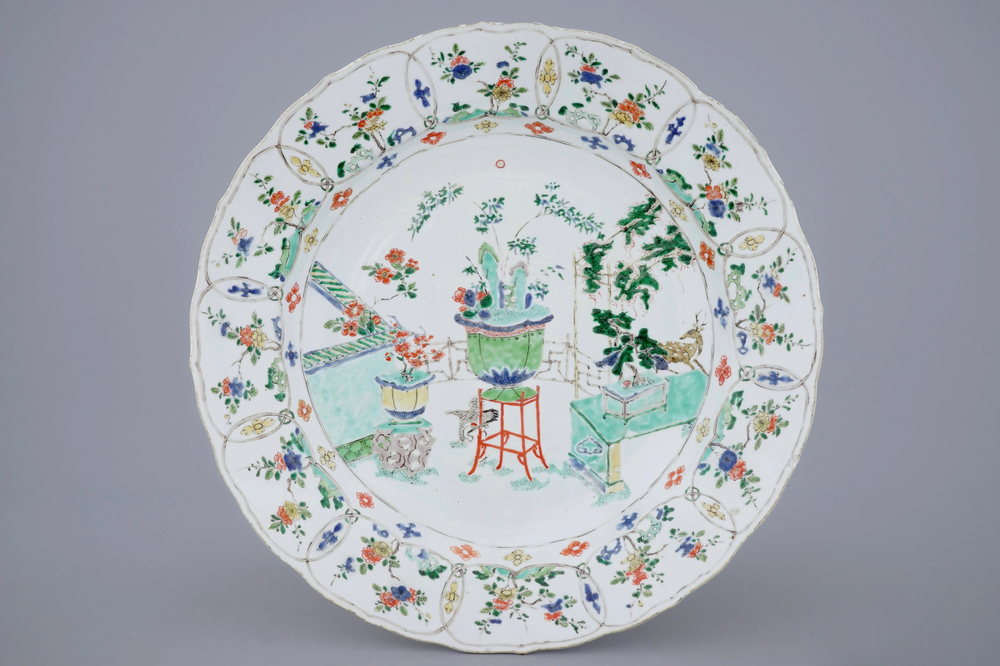 A large Chinese famille verte dish with a botanical garden, Kangxi