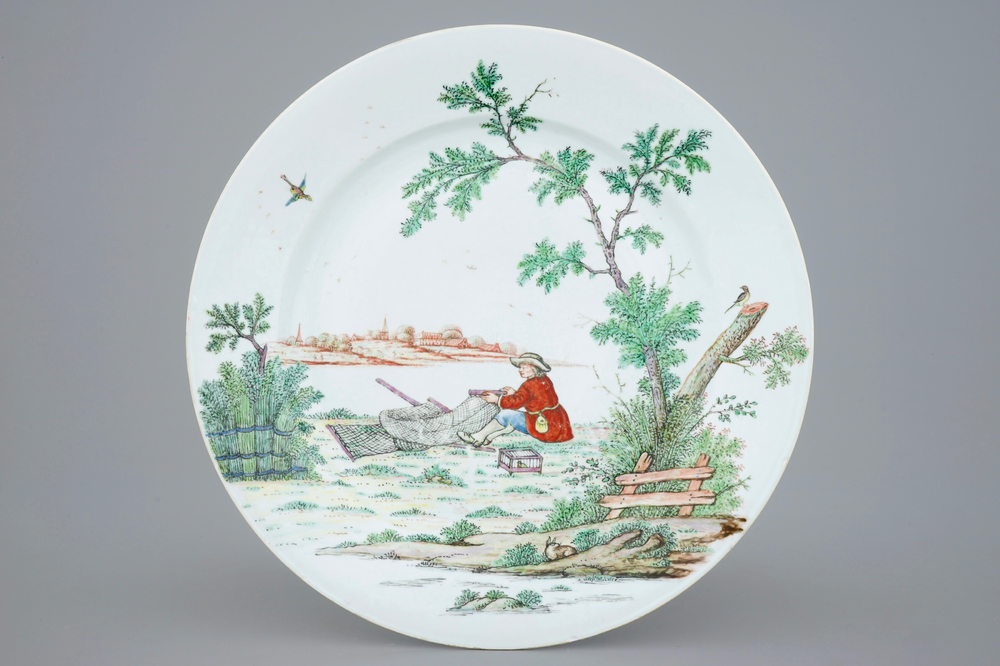 A large Dutch-decorated Chinese dish with a fisherman, 18th C.