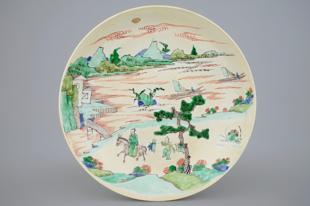 A rare Chinese famille verte caf&eacute; au lait ground landscape dish, Kangxi