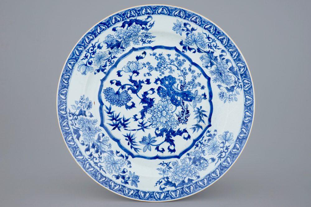 A large blue and white Chinese charger with a fine floral design, Qianlong, 18th C.