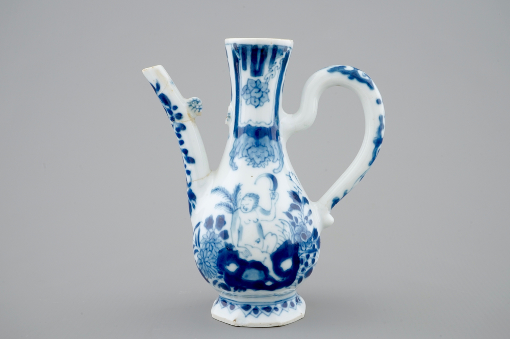 A small Chinese blue and white jug with a naked European, Kangxi