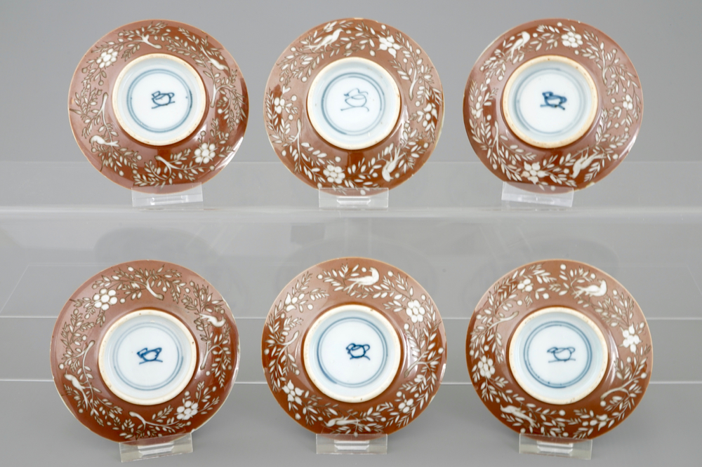 A set of six Chinese saucers with European wheel engraved decoration, Kangxi