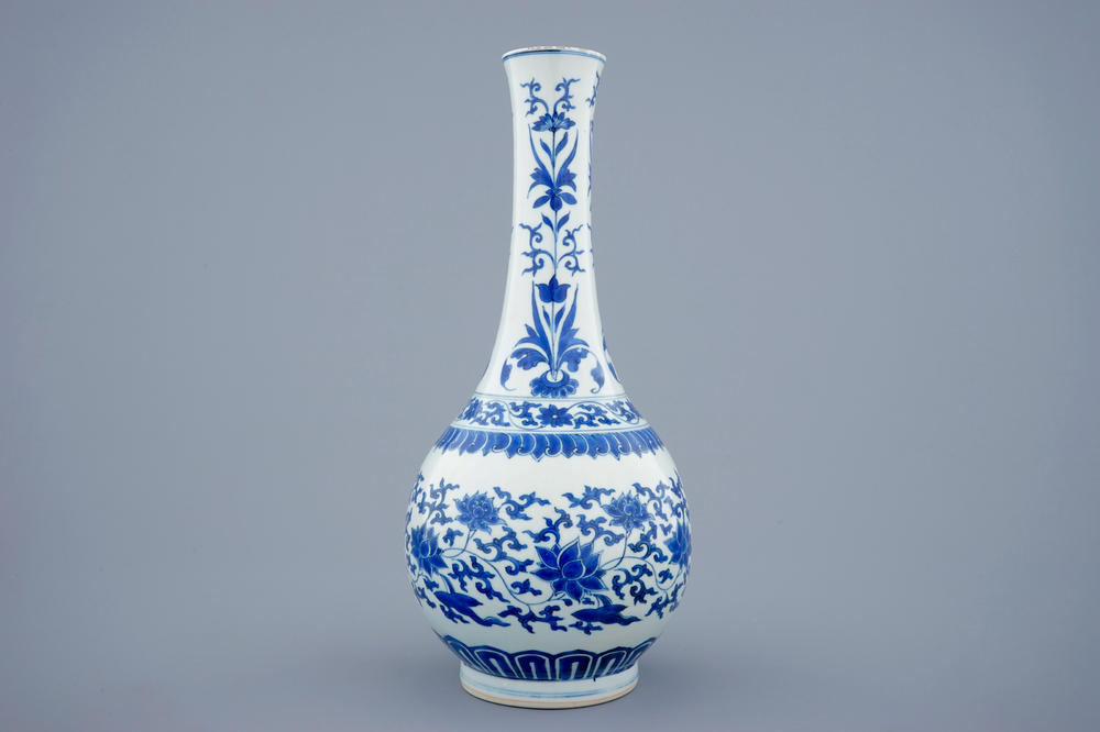 A blue and white Chinese lotus scroll bottle vase, Transitional period, 1620-1683