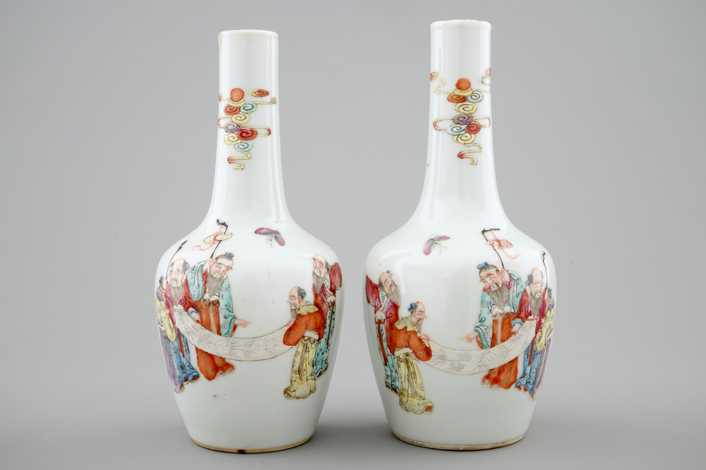 A pair of Chinese famille rose bottle vases, 19th C.