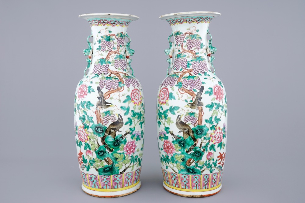 A fine pair of tall Chinese famille rose vases with birds, grapes and flowers, 19th C.