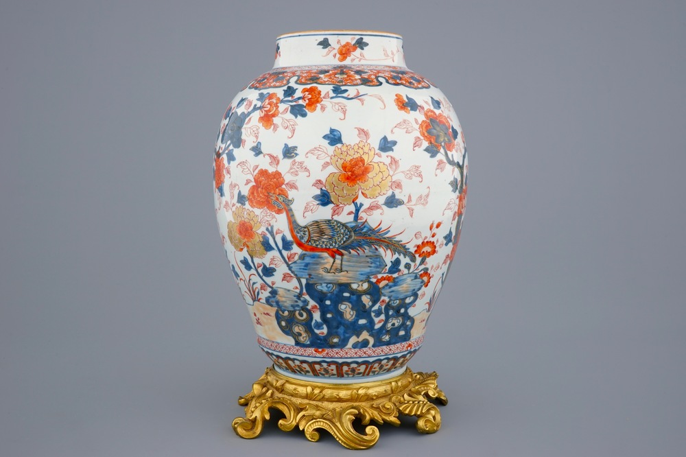 A large Chinese Imari-style export porcelain vase on gilt bronze foot, 18th C.