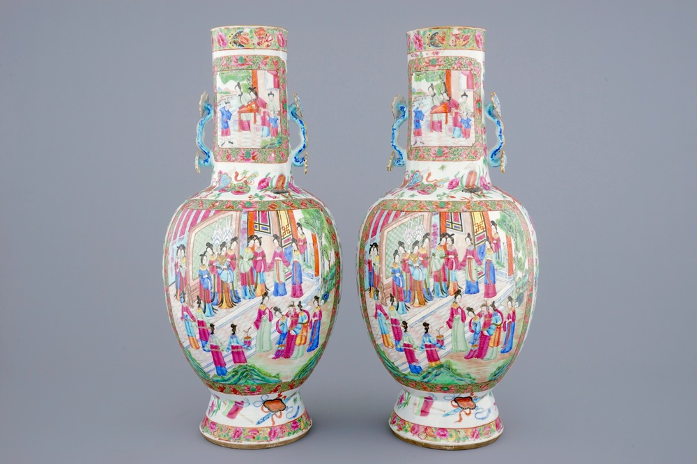A pair of Chinese Canton famille rose vases with ruyi scepter handles, 19th C.