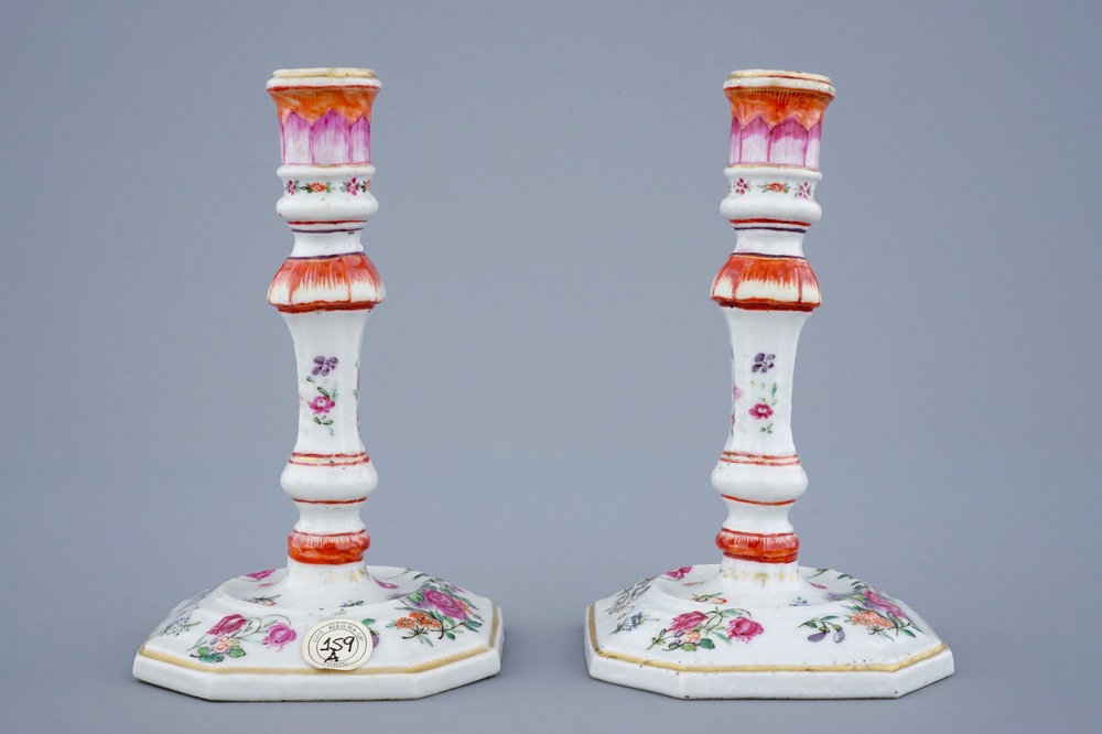 A pair of Chinese famille rose candlesticks, Qianlong, 18th C.