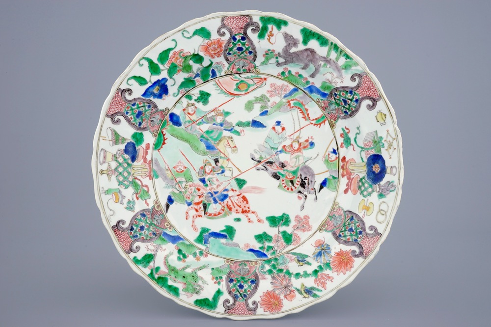 A Chinese famille verte dish with a war scene, Kangxi