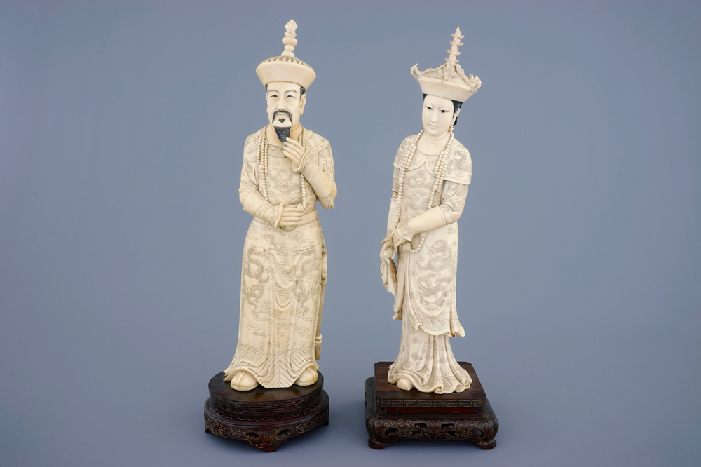A tall pair of Chinese carved ivory emperor figures, ca. 1900