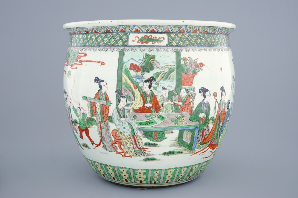 A Chinese famille verte fish bowl with figures, 19th C.